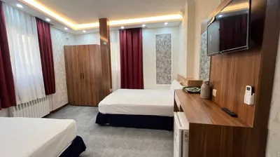اتاق مهمانپذیر بهشت نو مشهد